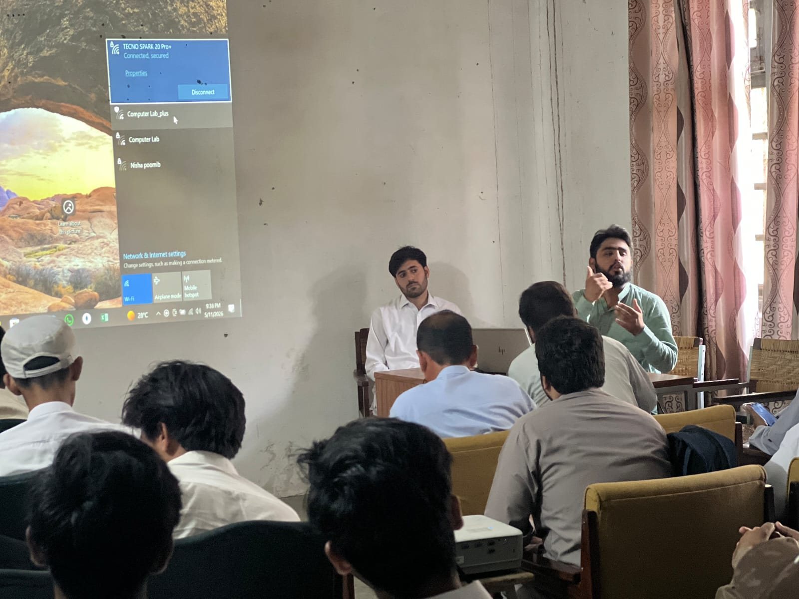 Educators attending an Urdu Ai teacher training session